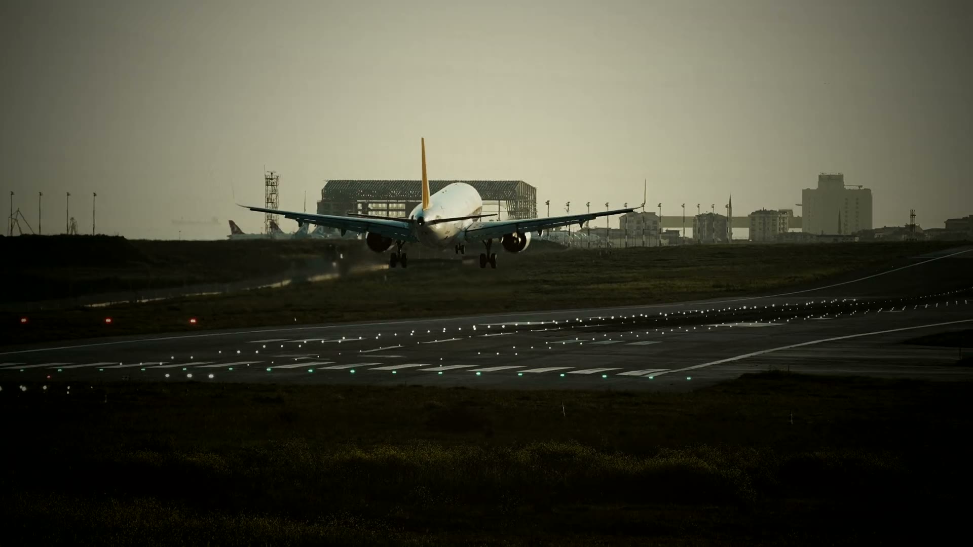 An airliner landing on a busy runway